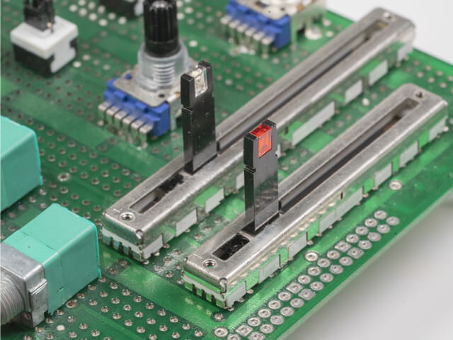 CTS slide potentiometers mounted on green pc board