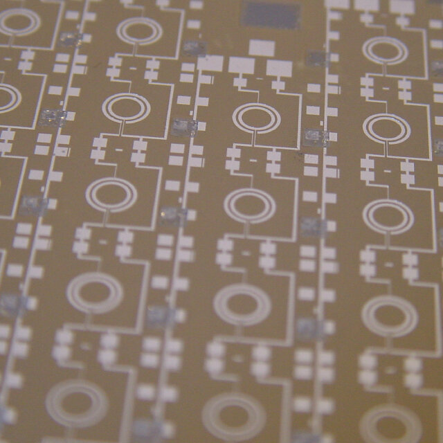 Printed piezoelectric thick film on printed circuit board