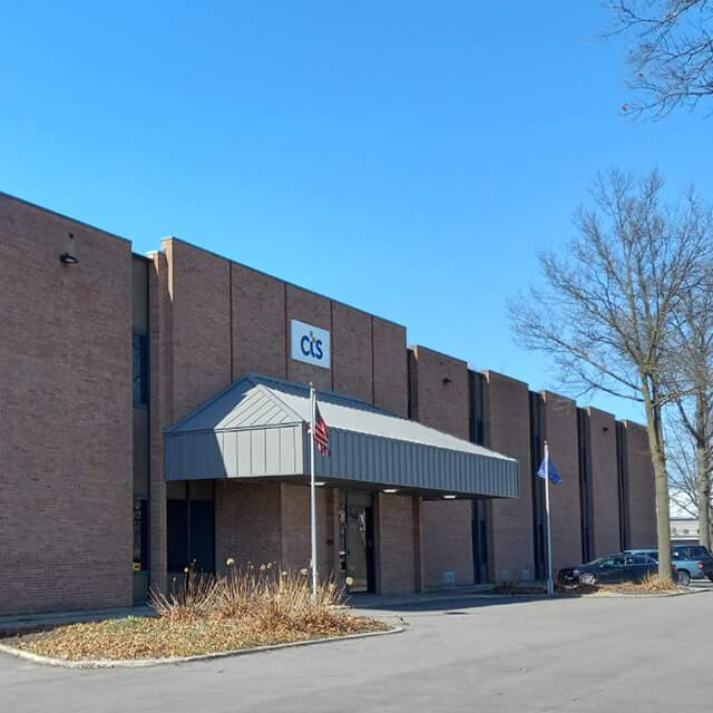 CTS facility in the winter season with a blue sky located in Elkhart, IN