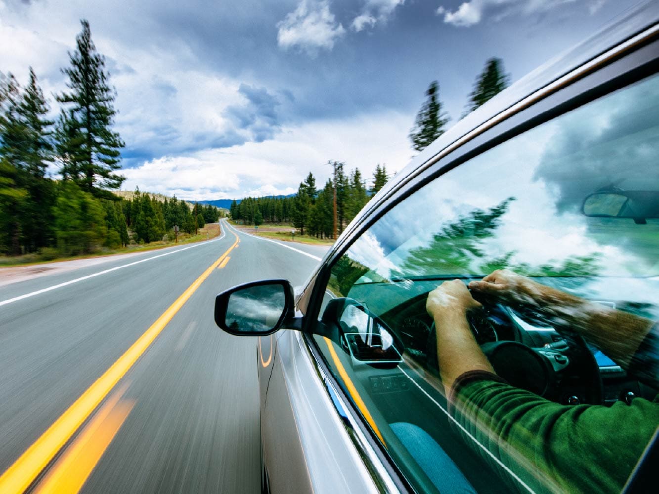 Electric vehicle driving on country road