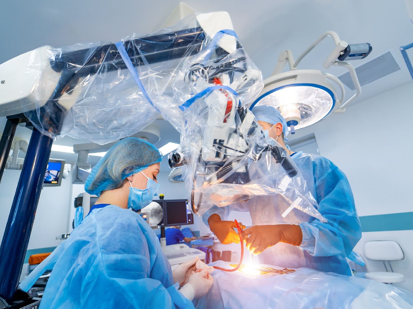 Surgeons conducting minimally invasive surgery