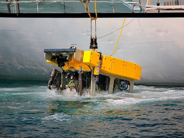 ROV being lowered into ocean