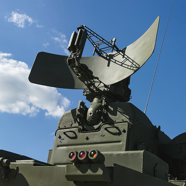 Image of portable green military radar communications tower