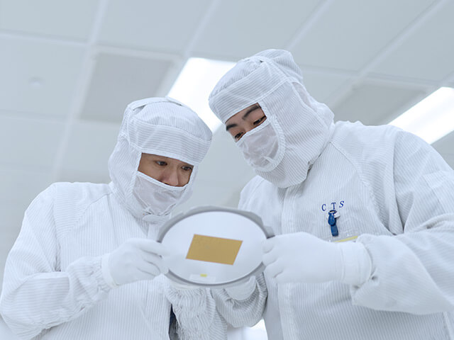 CTS engineers looking at product