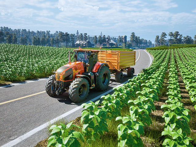 Tractor driving down road next to fields